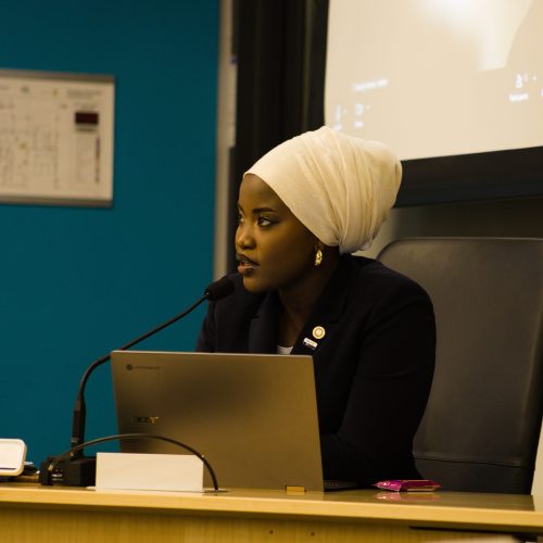 Student leader presenting at board meeting