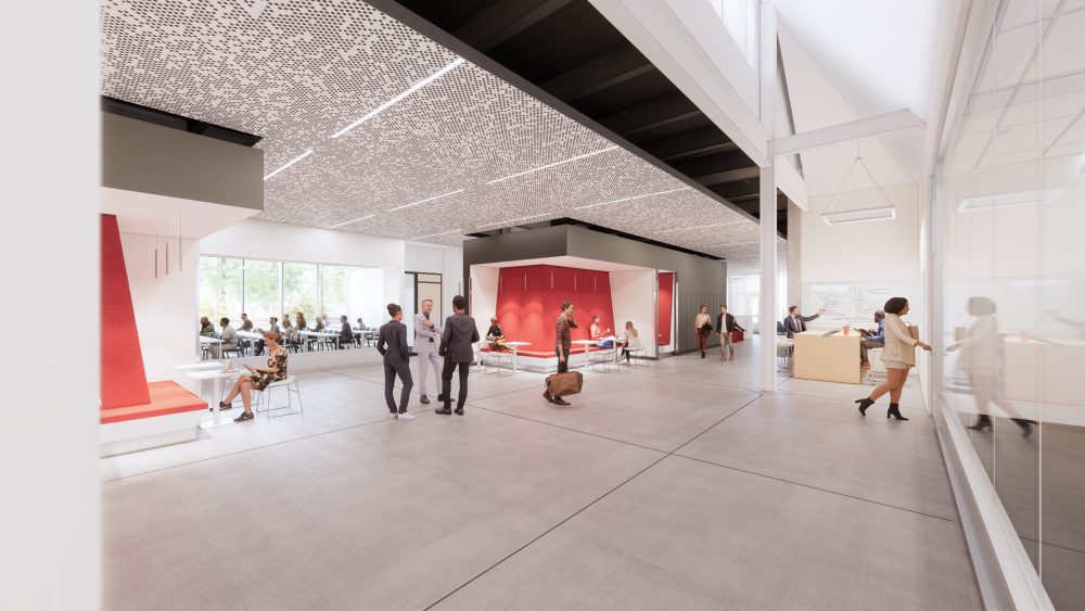 Rendering of interior view of the building, looking at the center circulation space for individual and group study.