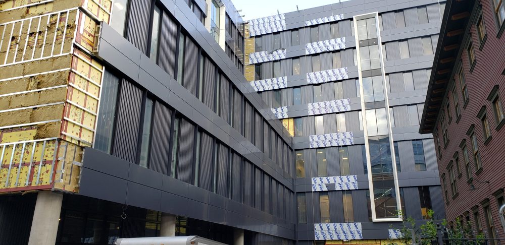 Exterior courtyard seen from 5th Ave.