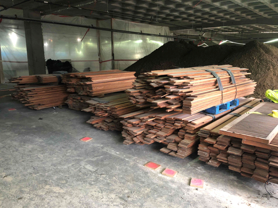 Existing wood saved for reuse on interior siding