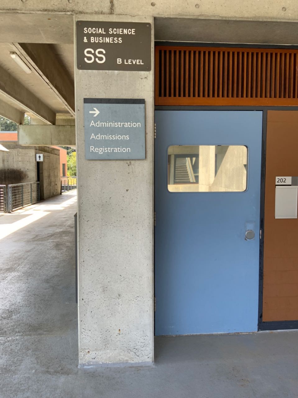 Science & Technology building identification showing other directional signs