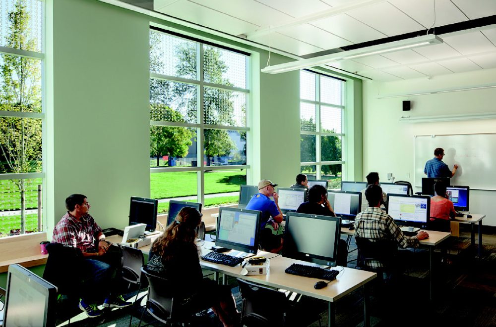 Students in a bright classroom