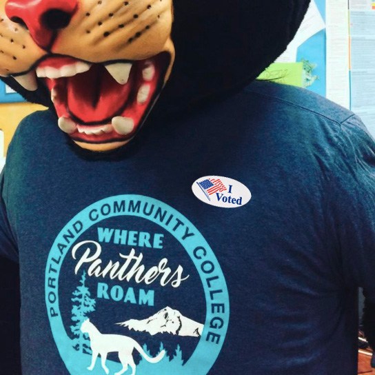 Poppie the Panther wearing an I Voted sticker