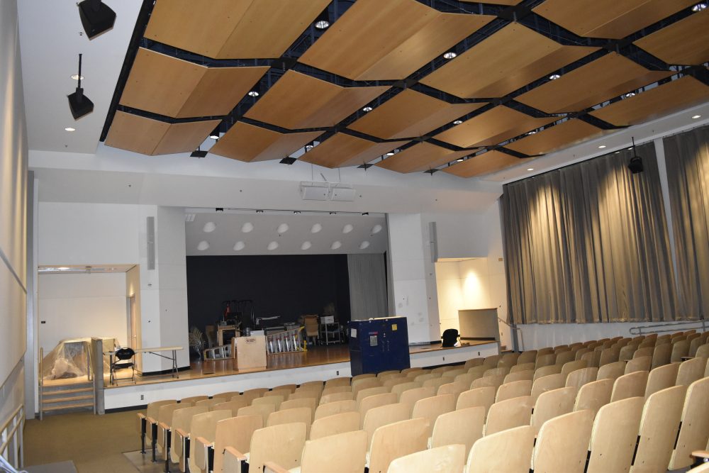 View of Moriarty auditorium seen from the back, focused on ceiling panels with enhanced acoustic material