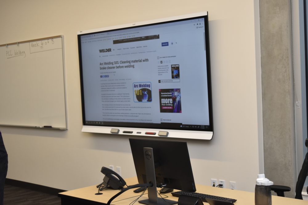 Smartboard and podium at OMIC Training Center classroom