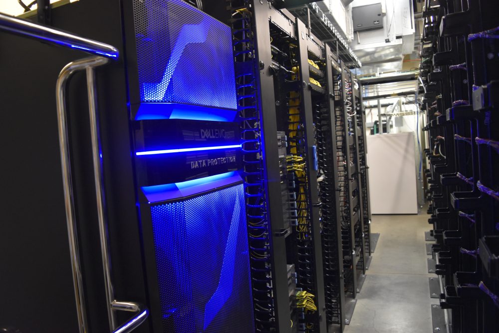 Racks of cables and connectors inside the main network room in Cascade Campus