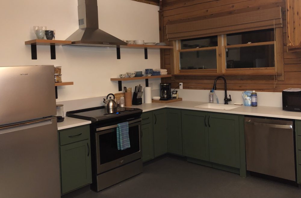 Renovated kitchen at Writers House with universal height cabinets and counters and new appliances