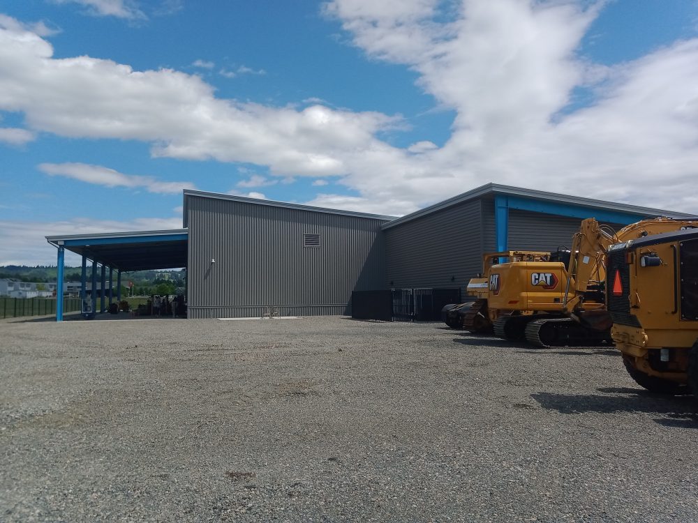 Yard outside new Dealer Service Building to store large Caterpillar vehicles