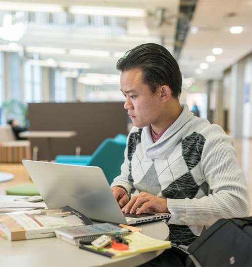 Student using a laptop for classwork