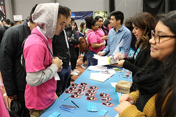 Students running an information table