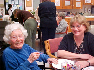 Patti and senior friend smiling