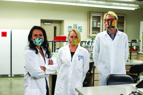 Three faculty from Biotechnology department . Two women and one man.