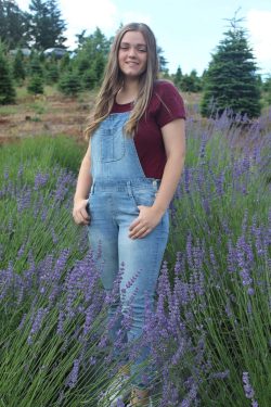 Kelly Miller standing in a lavender field