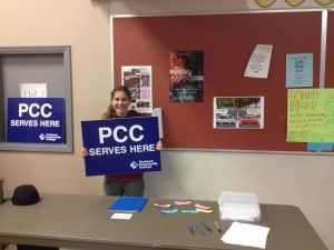 AmeriCorps VISTA member, Heidi Whitehouse, staffs the PCC Sign-In Table at the MLK Day of Service event.