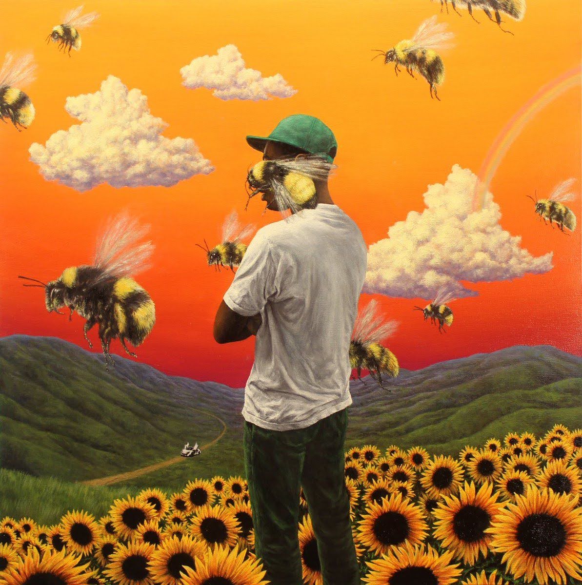 Album art depicts a man with medium-dark skin tone wearing a white shirt, dark green pants, and a green hat. He is standing in a sunflower field. A flock of large bees pass by, one obscuring his face, and an orange-red sky acts as the background.