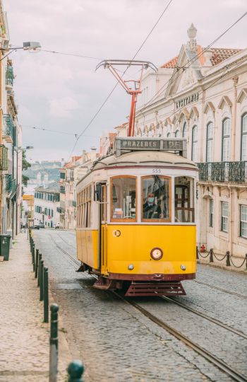 yellow streetcar in a European city