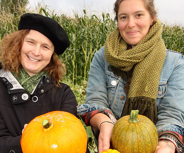 Sustainability staff posing with pumpkins