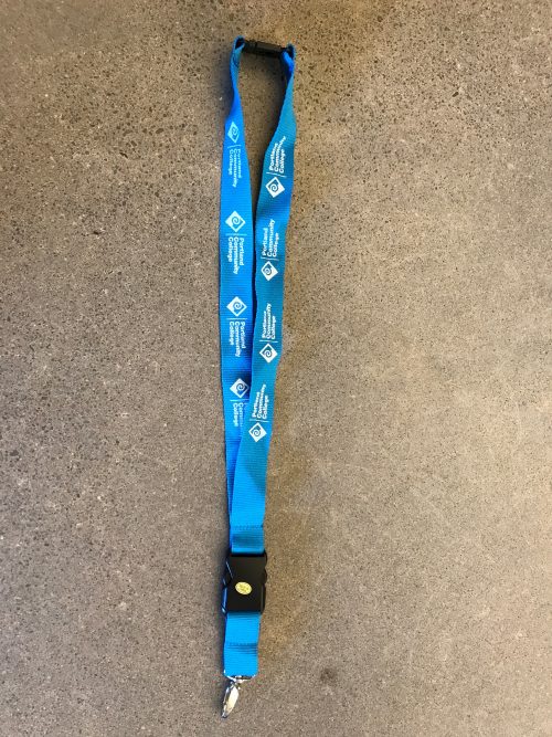 Turquoise lanyard with a repeated white PCC logo