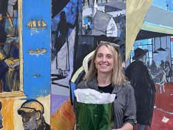 Tara Gabsi holding a gift bag.