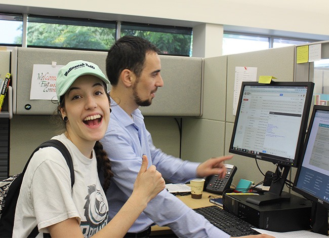 Student getting help from a staff member