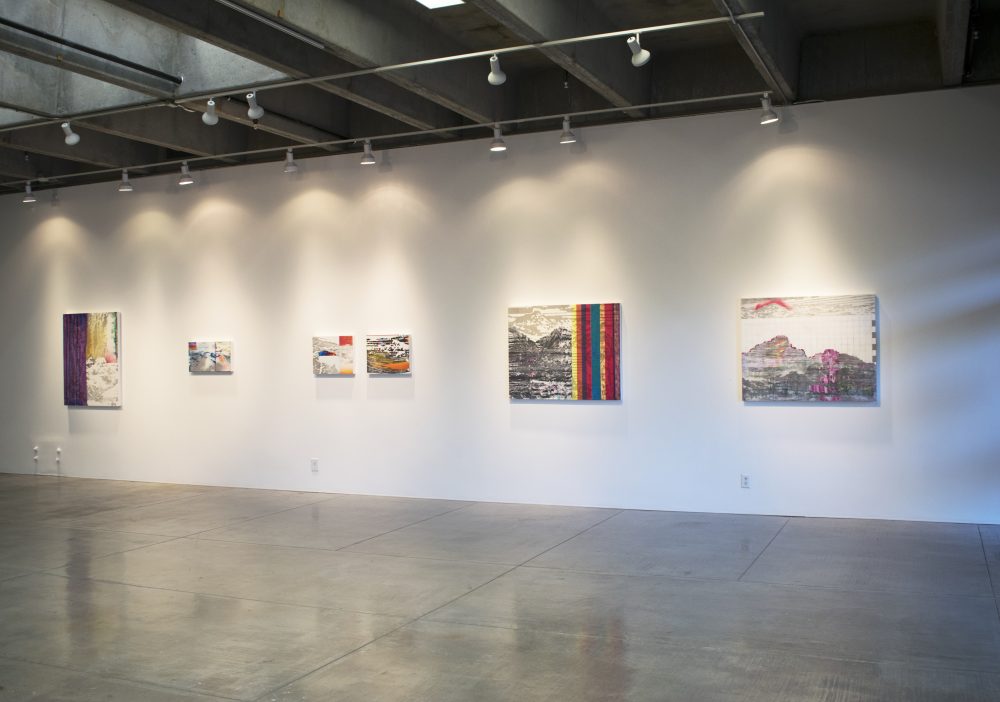 Gallery wall with five abstract, landscape paintings ranging in size from 13.5 by 20 inches to 36 by 45 inches.