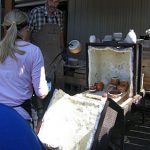 The kiln is fired to 1900 degrees Fahrenheit in approximately 30 minutes. The pots are then removed using gloves and long tongs.