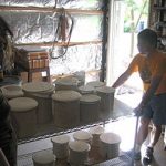 The sealed saggars are stacked and fired to approximately 1600 degrees Fahrenheit in a gas kiln. The process takes approximately 2 hours. The kiln is allowed to cool naturally, then is unloaded.