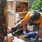 Through a "stoking hole", wood that has been soaked in salt water and dried is stoked every few minutes after approximately 2000 degrees Fahrenheit is reached.