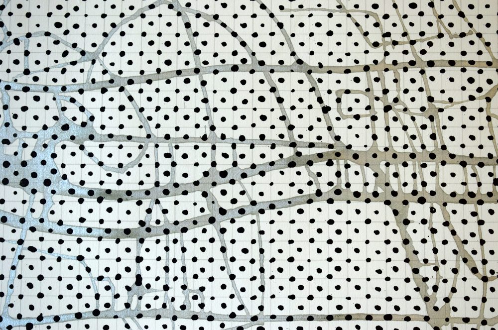 Detail view of larger wall installation. Abstract painting based on a grid, showing black dots on a grid of pencil