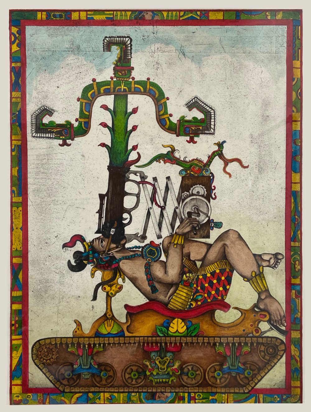 Intalglio print that has been hand colored. A male figure dressed in the style of indigenous people of Central America is laying back on an elaborately decorated platform. His body is seen in profile. The base of the platform looks like the base of a tank, with gears and a tread. Protruding from the mouth of the man is what looks like the barrel and scope of a weapon, and a tall plant grows out of that barrel. In the background is a cloudy sky with a band of light blue at the top. A colorful border frames the image. Predominant colors in the work include green, red, yellow, brown and blue
