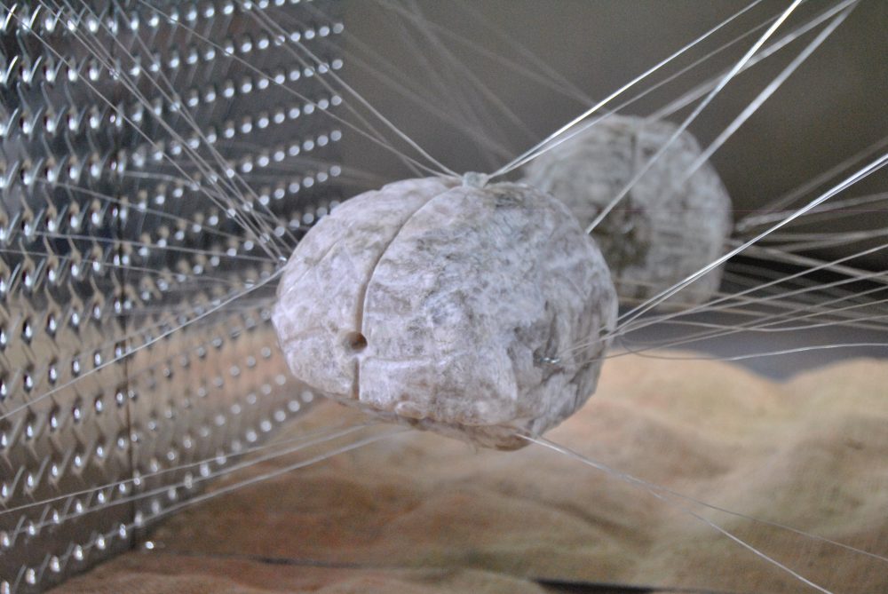 Gabrielle Veillet; What if, 2019; Alabaster Stone, Fishing line, Metal, and Mirror; 17 x 24 x 17"; Sculpture