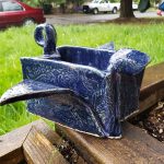 Dora Morin, Origami Crane, 2019, recycled clay, 5.5" x 12.25" x 8"