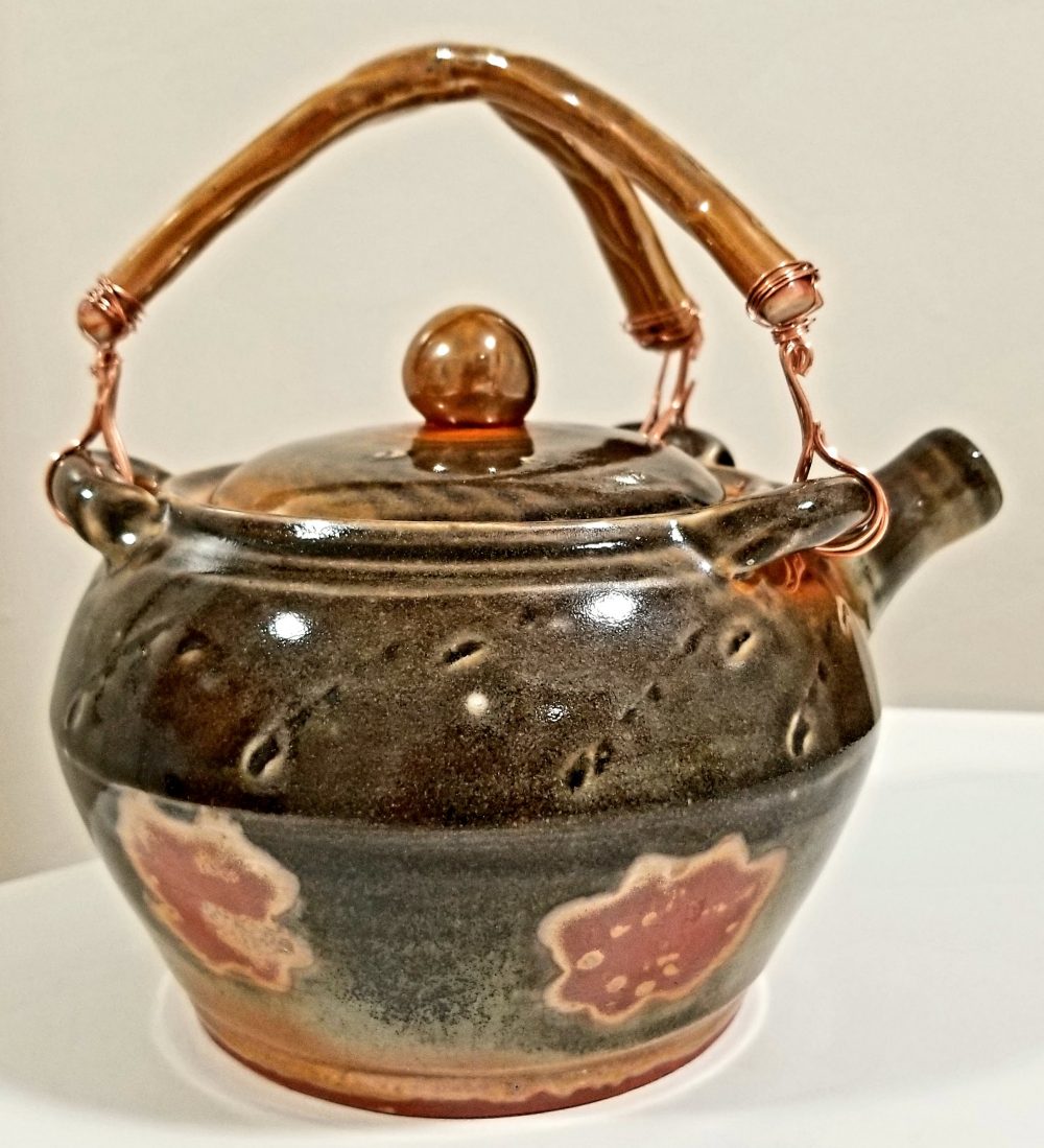 Leila Piazza, Earthen Teapot, 2020, mac-10 clay fired at cone 10, copper wire, 7" x 6.5" x 6.5"