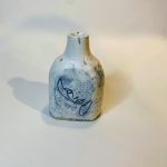 Shania Sweet, The Woman in the Bottle, 2020, wheel throwing clay, glaze, and laser glaze etching, 3.5 "x 2.5" x 1.75"