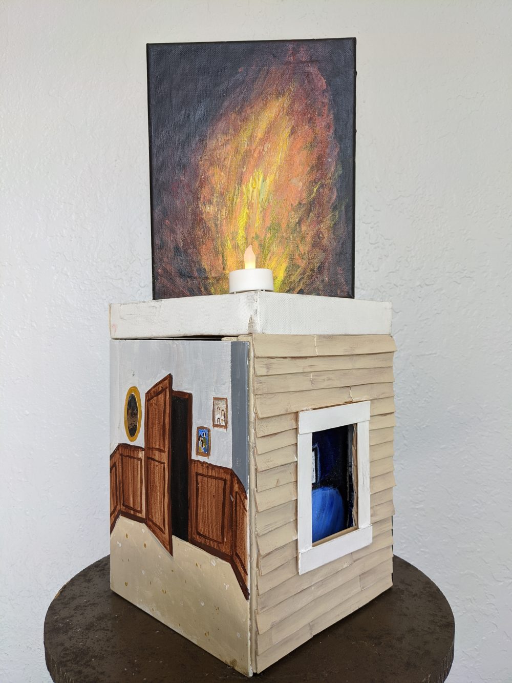 Katherine Wood, The Places I've Slept Won't Let Me Sleep, 2020, acrylic paint, canvas, wooden sticks, battery operated fairy lights and candles, 24" x 14"