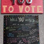 Katherine Wood, They Don't Want YOU to Vote, 2020, mixed media, "mirrored" paper, acrylic paint, glitter, cardboard letters on canvas and poster board, 42" x 24"