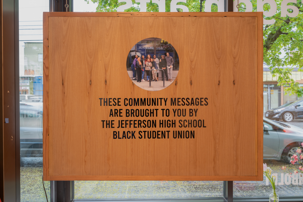 back of marquee sign in gallery window from 2019 exhibition