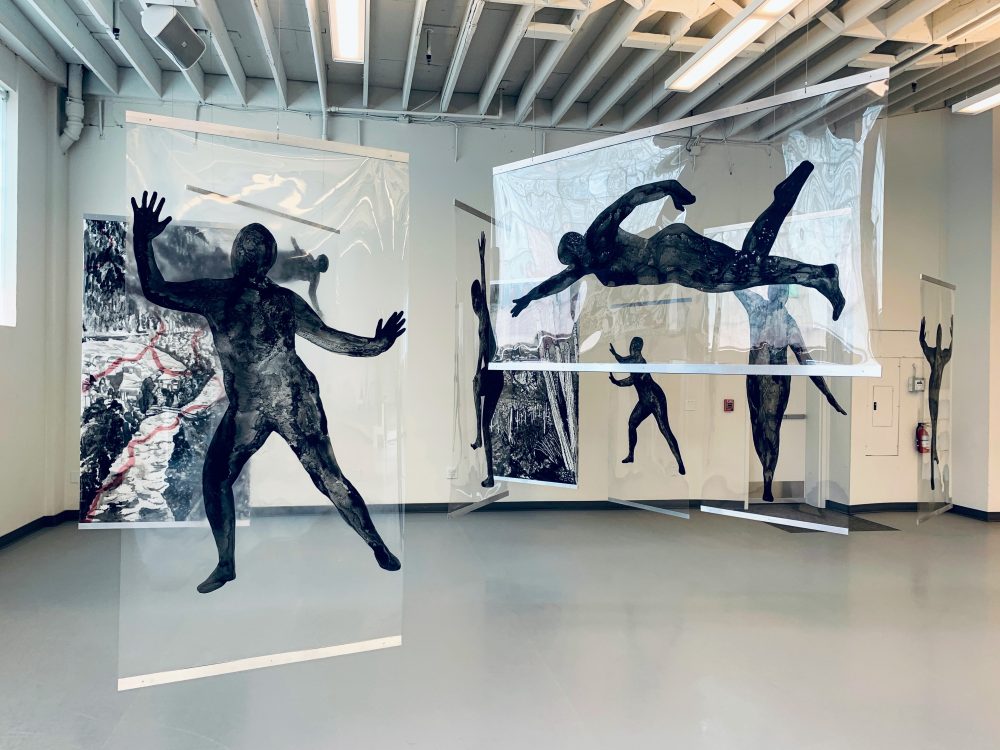 Sabina Haque, Detail of (UN)Belonging, installation at NW Dance Project, Portland, OR, January-February 2021, ink drawings on DuraLar and Mylar transparencies, 15 drawings, each 7' x 3' or 3' x 7'. Photographs by Ian Lucero.