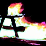 Photo, high contrasting colours, table blazing in light and fire.