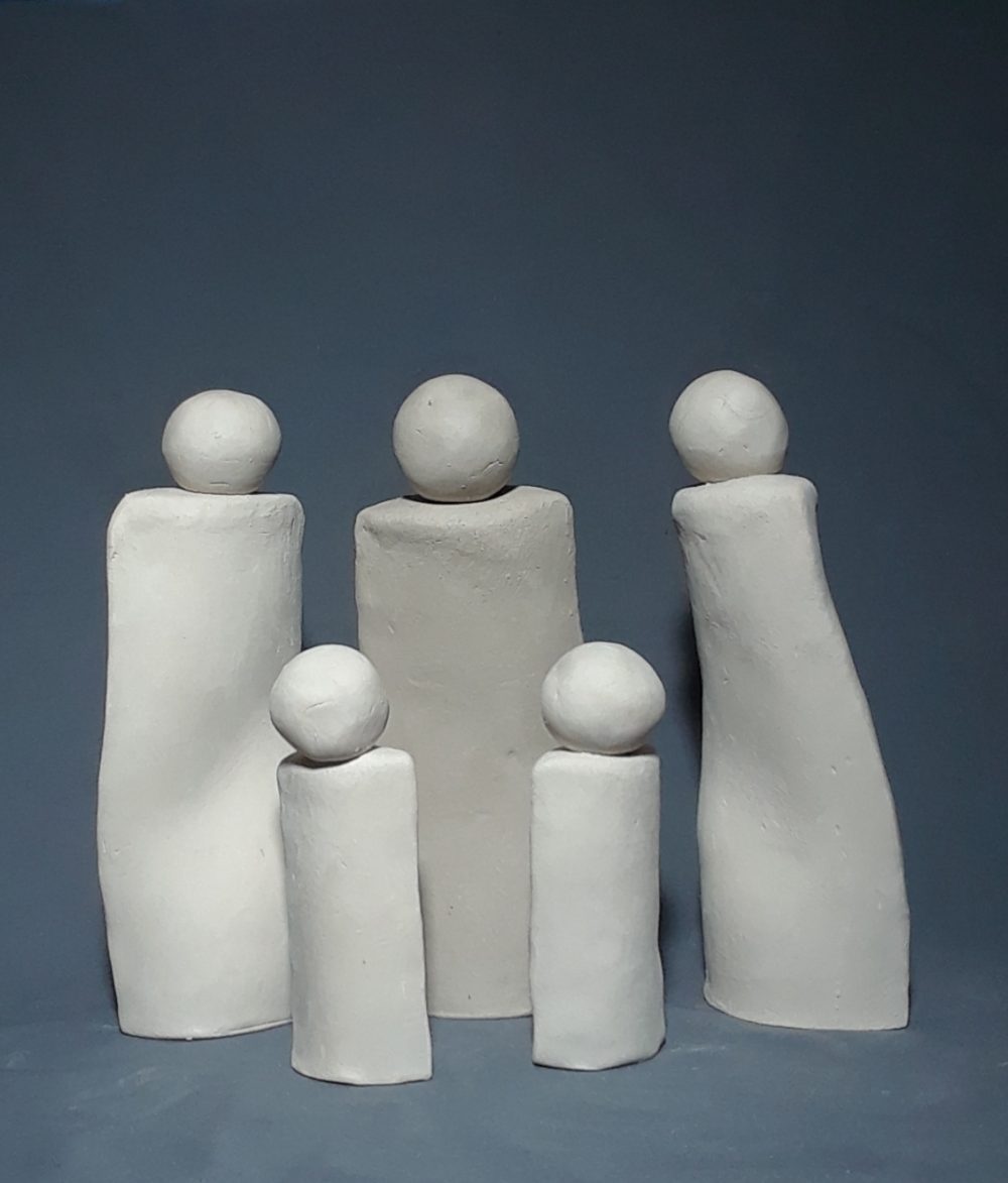 Slab work clay forms showing five people of various sizes and shapes to reflect diversity and loss of community.