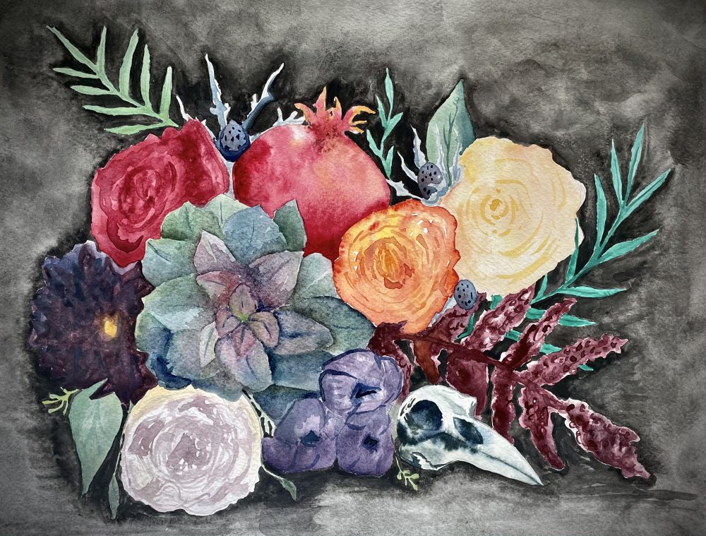A vibrant bouquet of flowers and greenery with a large succulent and bird skull included on a dark washed background.