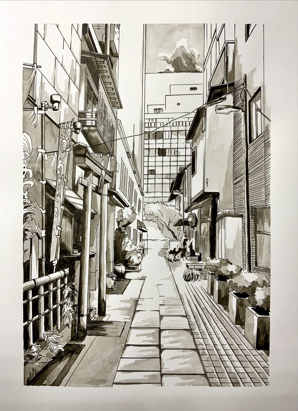 A picture of a peaceful alley inside a bustling city with eateries and cafes.