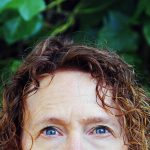 Close-up photo of the top half of a woman's face.