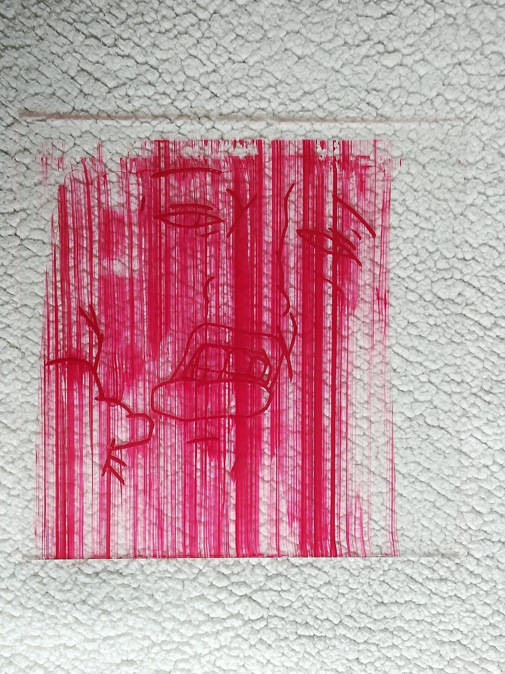 A line drawing of a face grimacing. The background is a crackly white texture.