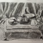 This is a still life showing a tea set for a chinese tea ceremony just before this ceremony would be started.