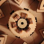 Photo close up of wooden elements of varying geometric shapes.