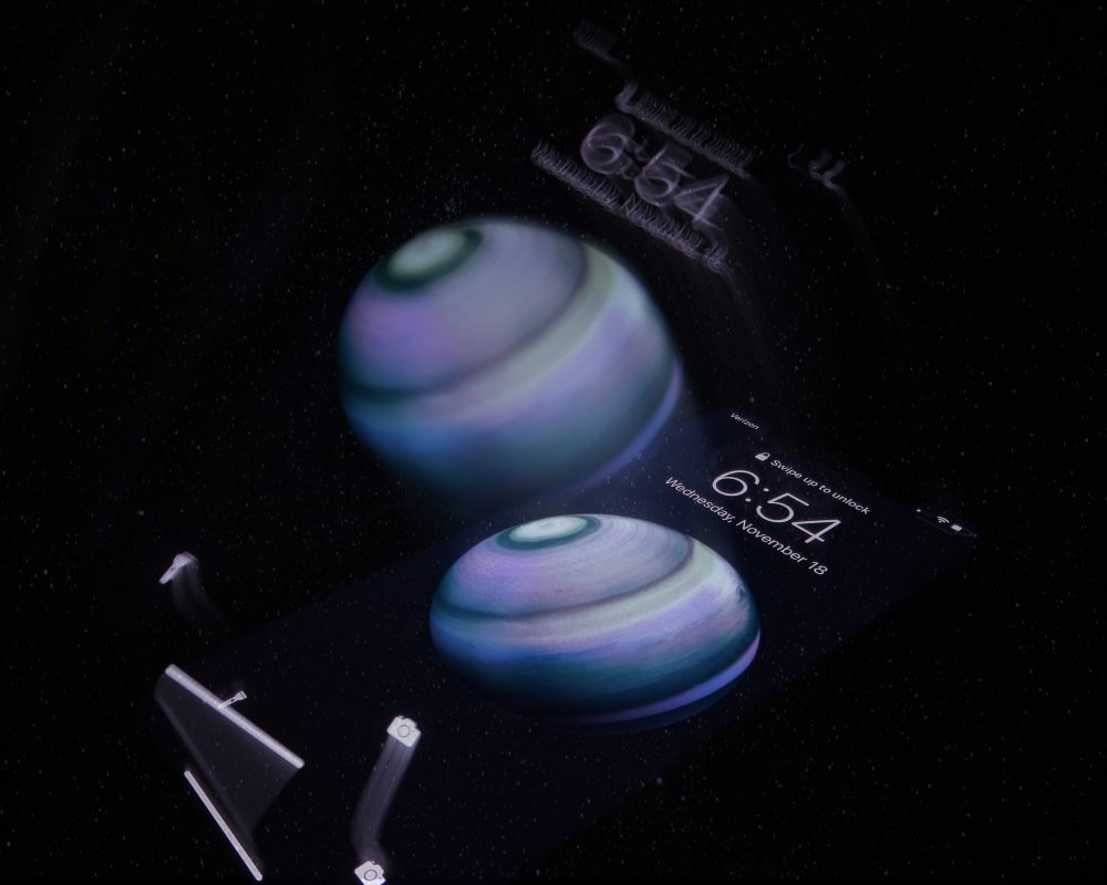 A photograph of shapes, letters, and numbers floating on a black background.