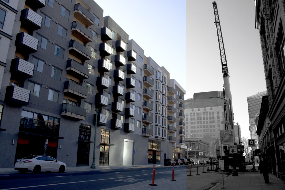 Urban scene with apartment buildings and crane.