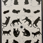 A design in black and white of cat mirror pattern with a daisy flower in the background.