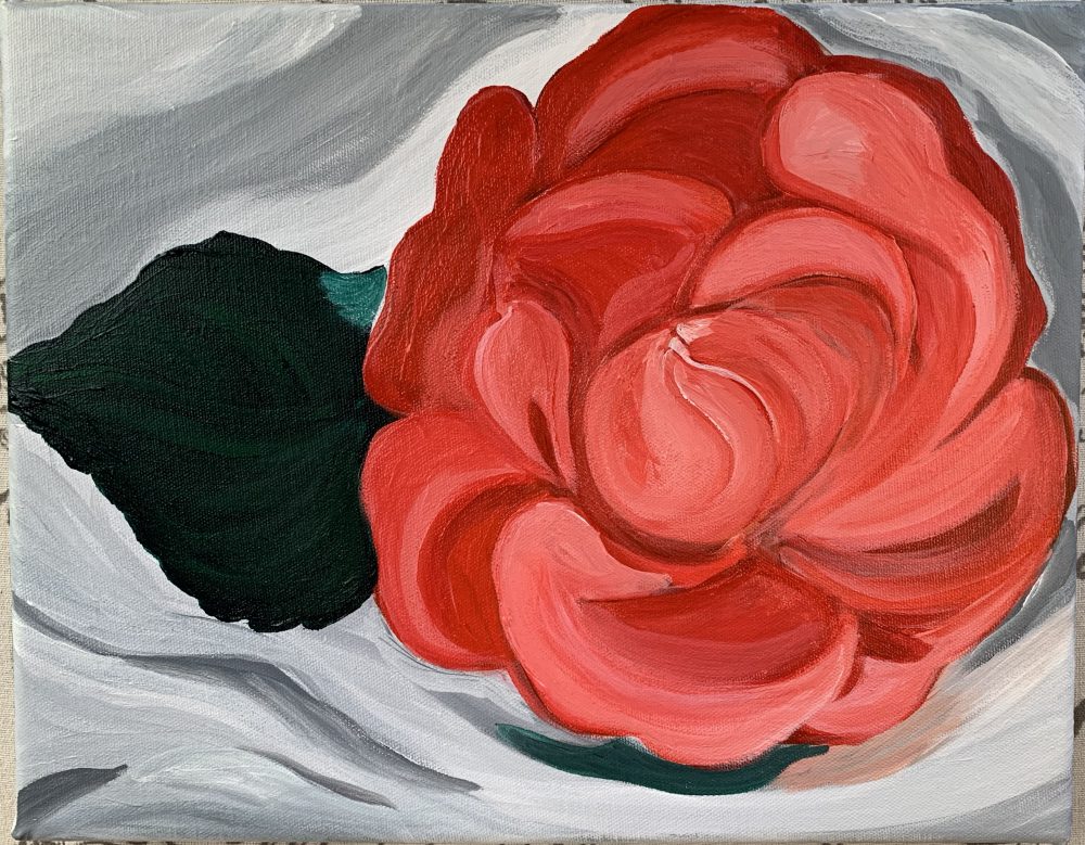 A Rose in a Glass Dish.